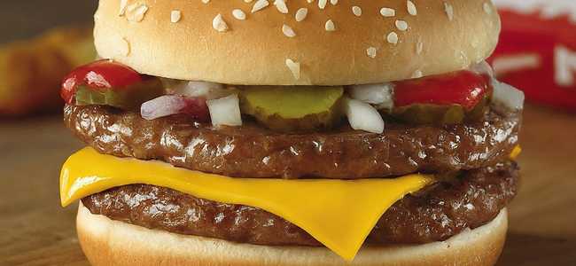 Hamburger on cutting board.