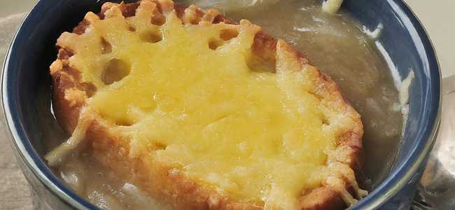 French onion soup with cheese bread in soup.