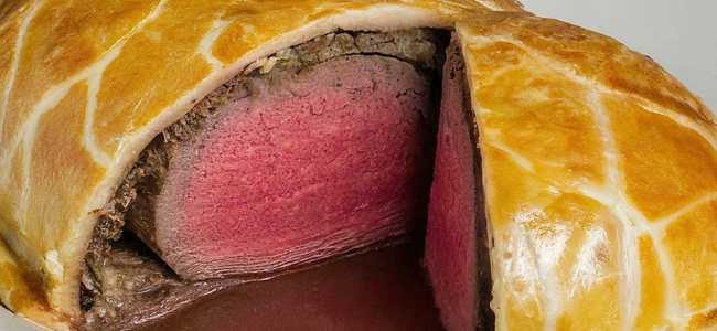 Beef Wellington on plate.